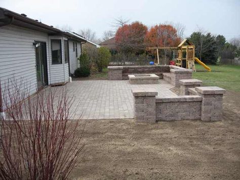 Pony wall around back patio Paver Patio With Water Feature, Square Patio Ideas, Patio And Fire Pit, Fire Pit Materials, Patio Design Ideas, Rustic Fire Pits, Fire Pit Lighting, Patio Pavers Design, Concrete Patios