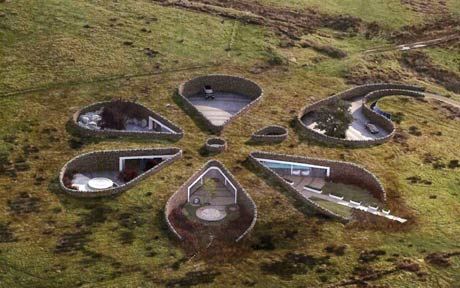 His architects likened it to a giant flower or a neolithic settlement but Gary   Neville's neighbours could never quite get over the resemblance to the set   of the Teletubbies. Case Sotterranee, Mental Block, Ground Source Heat Pump, Gary Neville, Earth Sheltered Homes, Eco House Design, Hobbit Houses, Earth Sheltered, Underground Homes