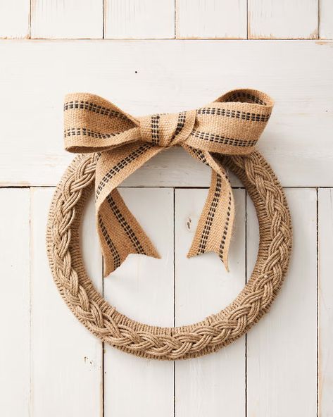 wreath form wrapped with twine with a braid made from the same material hung on a white barn door Jute Wreath, Diy Thanksgiving Centerpieces, Unique Fall Wreath, Dry Floral Foam, Diy Thanksgiving Crafts, Fall Crafts For Adults, Easy Diy Thanksgiving, Easy Fall Wreaths, Easy Thanksgiving Crafts