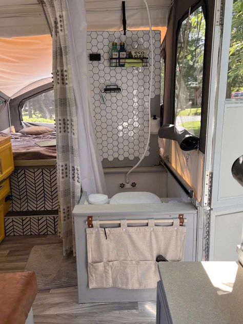 Living In A Popup Camper, Popup Camper Toilet Ideas, Popup Camper Bathroom Ideas, Travel Trailer Shower Remodel, Cozy Pop Up Camper, Pop Up Camper Shower Ideas, Living In A Pop Up Camper Full Time, Tent Trailer Hacks, Pop Up Camper Must Haves