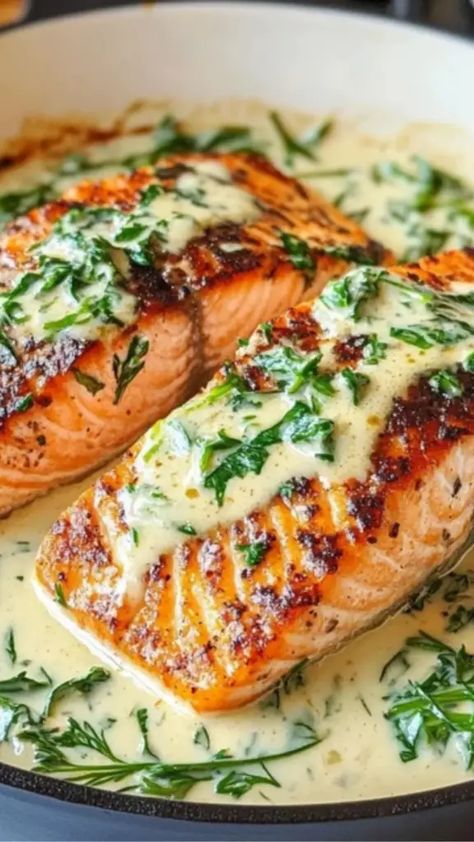 Cooking salmon at home might seem intimidating to beginners, but this Salmon with Garlic Cream Sauce recipe proves that gourmet dining can be simple and approachable. Whether ...  
The post Mastering Salmon with Garlic Cream Sauce: A Beginner-Friendly Guide appeared first on Lidia Recipes. Garlic Cream Sauce Recipe, Comfort Foods Healthy, Lidia's Recipes, Creative Dinner Ideas, Cream Sauce Recipe, Creative Dinner, Frozen Salmon, Garlic Cream Sauce, International Dishes