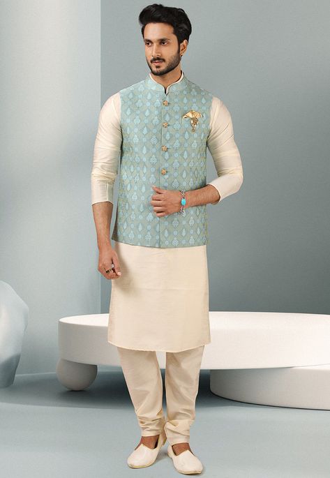 Art Silk Kurta in Off White This Readymade attire is Enhanced with Buttons, has Pockets and is Crafted in Chinese Collar Neck and Full Sleeve Available with an Art Silk Churidar in Off White and an Art Silk Jacquard Nehru Jacket in Sky Blue Do note: Footwear shown in the image is for presentation purposes only. Half to one inch may vary in measurement. (Slight variation in actual color vs. image is possible) Traditional Indian Mens Clothing, Engagement Dress For Groom, Indian Wedding Suits Men, Mens Traditional Wear, Indian Wedding Clothes For Men, Nehru Jacket For Men, Waistcoat Designs, Boys Kurta Design, Wedding Kurta For Men