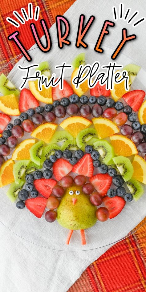 This Turkey Fruit Platter is a fun and delicious way to serve up a healthy appetizer at your next Fall or Thanksgiving gathering. Turkey Fruit Platter Thanksgiving, Thanksgiving Fruit Platter Turkey, Fruit Platter Designs Thanksgiving, Turkey Shaped Fruit Tray, Turkey Fruit Pizza, Fruit Thanksgiving Platter, Thanksgiving Fruit Turkey, Thanksgiving Fruit Trays, Turkey Crudite Platter