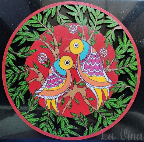 Two love birds sitting on a tree painted in Indian folk art Madhubani style. A red background symbolic of the colour of love and earthy colours as is typical of Indian folk art. Maithili Painting, Madhubani Birds, Indian Folk Art Madhubani, Folk Art Madhubani, Mithila Painting, Round Painting, Gond Art, Diy Paintings, Gond Painting