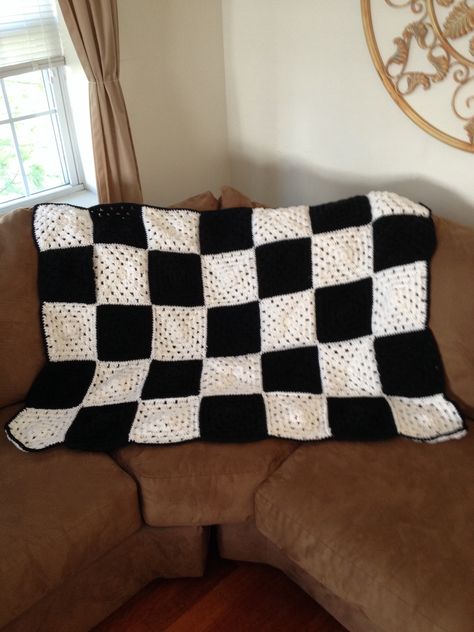 Warm up this winter in this crochet checkered flag afghan.  It consists of 18 white and 17 black granny squares.  This is a MADE TO ORDER item.  It will ship upon completion after receiving payment in 1 to 2 weeks.  100% acrylic Buffalo Check Granny Square Blanket, Granny Square Blanket Black And White, Black And White Checkered Crochet Blanket, Checkered Granny Square Blanket, Crochet Checkered Blanket, Granny Square Checkered, Checkered Crochet Blanket, Crochet Blanket Black, Crochet Black And White