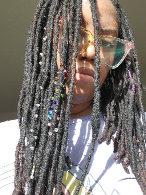 Locs with glass beads in the sun Sprinkle Locs, Loc Sprinkles Locks, Loc Sprinkles, Dreadlocks Jewelry, Prom 2k24, Hair Twists Black, Sprinkles Design, Hair Twists, Loc Inspiration