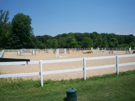 The Outdoor Riding Arena is beside the new Indoor Arena and measures 150' x 250' and features eurofelt footing (100_1428). Jumping Arena Outdoor, Riding Arenas Outdoor, Horse Riding Arena Outdoor, Outdoor Arena Horses, Outdoor Horse Arena, Outdoor Riding Arena, Arena Footing, Horse Riding Arena, Equine Stables