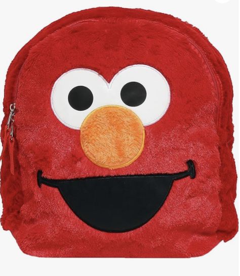 Acrylic Imported Nylon lining Zipper closure Hand Wash Only ELMO PLUSH BACKPACK – With nylon lining inside, this happy Elmo 12 inch mini backpack is made from medium pile plush, making it as soft as your child's favorite stuffed animal. It has vinyl appliqued eye & mouth patches, and a plush applique nose. DESIGNED FOR KIDS - The padded back and padded straps are adjustable for the extra comfort and fit. The bright red color helps kids stand out in a crowd. And best of all, they can cuddle with Elmo Stuffed Animal, Toddler Cookies, Elmo Toys, Cookie Monster Plush, Plush Making, Sesame Street Plush, Elmo Plush, Monster Backpack, Elmo And Cookie Monster