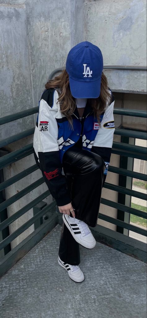 streetstyle outfit inspo racer jacket outfit ideas skater style city vintage bomber jacket style leather pants outfit blue LA dodgers hat outfit ball cap adidas forums instagram photo ideas poses #streetstyle #outfitideas #streetstylefashion Blue Hat Outfit Baseball Caps, Blue Racer Jacket Outfit, La Baseball Cap Outfit, Ball Cap Outfits For Women, La Dodgers Hat Outfit Women, Nyc Hat Outfit, La Dodgers Hat Outfit, Cap Outfits For Women Street Style, La Cap Outfit