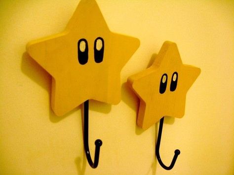 Coat hooks made into Super Mario Stars Mario Stars, Mario Bros Room, Nintendo Room, Gamer Room Diy, Super Mario Room, Mario Room, Mario Star, Nerd Room, Games Room