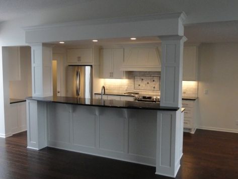 If I have to have columns.... these are good ones.( Raised island/ breakfast bar with columns) Bar With Columns, Kitchen Columns, Columns Interior, Basement Kitchen, Kitchen Redesign, Kitchen Island With Seating, Island Ideas, Kitchen Remodeling Projects, Open Concept Kitchen