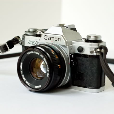 35Mm Camera | 1980s Canon AE1 35mm SLR camera with 50mm f18 lens by newamsterdam 1980s Camera, Comics Script, Photographer Equipment, Cannon Camera, Fotocamere Vintage, Best Digital Camera, Camera Sony, Photo Lens, Canon Ae 1