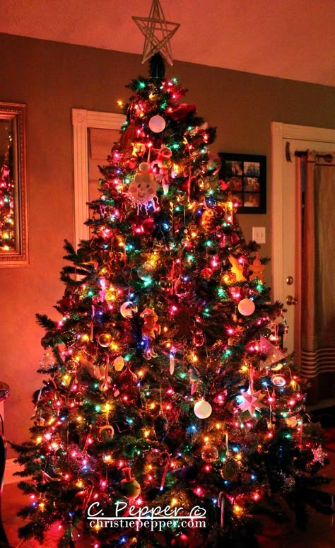 This reminds me of my tree at home. ALL of the decorations... EVERYWHERE Colorful Lights Brown Odiments Christmas Tree, Colorful Chrismtas Tree, Colorful Christmas Tree Lights Aesthetic, Christmas Tree Multicolor Lights, Brught Color Xnas Tree, Rainbow Lights, Beige Christmas, Christmas Sleepover, Christmas Aesthetics