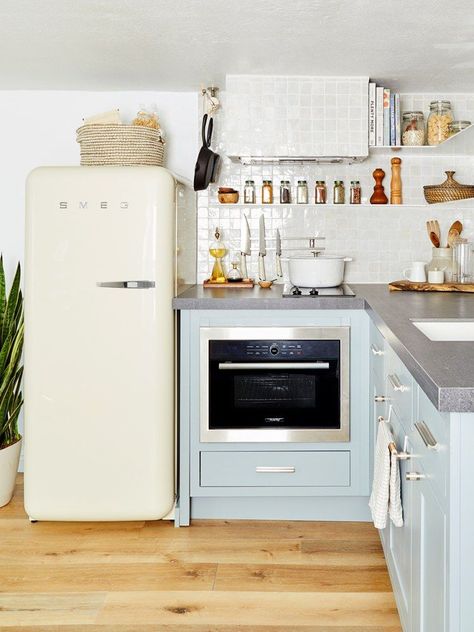 Retro Smeg refrigerator in blue kitchen Bookshelves Modern, Smeg Refrigerator, Floating Desks, Custom Shelf, Vintage Fridge, Smeg Fridge, Emily Henderson Design, Boho Apartment, Polar Opposites