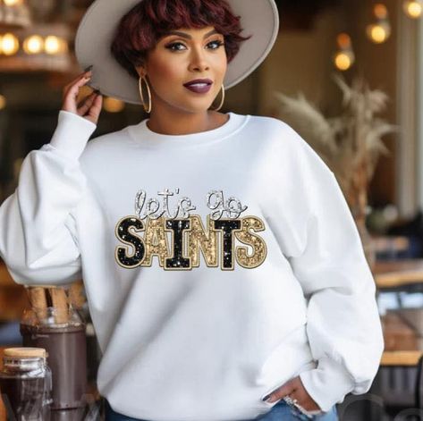 Tired of freezing at the stadium? Stay warm with one of our trendy sweatshirts. www.charzdesignz.com #charzdesignz Faux Embroidery, Team Sweatshirts, Saints Football, Football Sweatshirt, Sequin Embroidery, Embroidery Sweatshirt, Holiday Sweatshirt, Sequins Embroidery, Trendy Tee