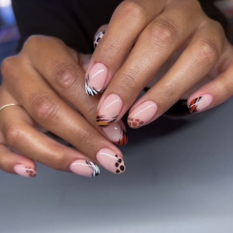 Animal print frenchies 🦓 On a short almond with all neutral tones 🤎 #nailart #naturalnails #naturallongnails #gelnails #bayareanails #groovynails #nailinspo Short Almond Cheetah Nails, Animal Print Tip Nails, Zebra Nail Art Designs, Animal Print French Nails, Short Leopard Print Nails, Safari Themed Nails, Safari Theme Nails, Animal Print French Tip Nails, Safari Nails Designs