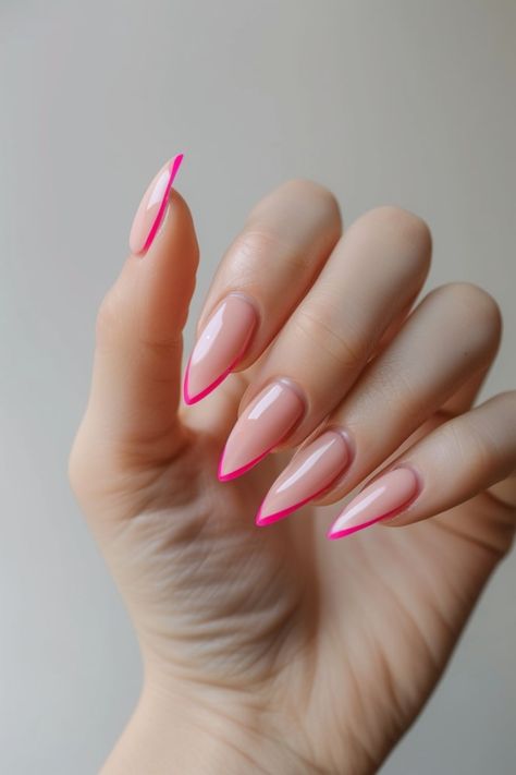 Discover the charm of pink French tip nails with our curated collection of 25 enchanting designs! From soft pastel hues to bold magentas, each nail art inspires elegance with a playful twist. Perfect for any occasion, these chic manicures add a touch of sophistication to your everyday style. Tap the link for more pink French tip style inspiration! Blush Tip Nails, Bold French Tip Nails, Reversed French Tip, Pink French Tip Nails By Skin Tone Range, Pastel Nail Art Designs, Pink Monochrome French Tip Nails, French Nails With Pink, Slanted French Tip Nails, Pink French Tip Stiletto Nails