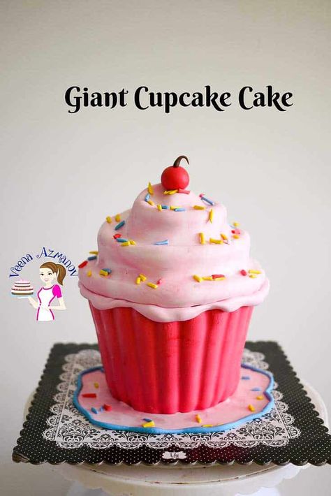 A giant cupcake cake makes a fun and adorable cake for anyone at any age at five or fifty. This simple, easy giant cupcake tutorial will have you making it more often than you planned. Whether you are a home baker or a professional cake decorator a giant cupcake is one fun cake to make for family or customers. Giant Cupcake Recipes, Large Cupcake Cakes, Giant Cupcake Cake, Extreme Cakes, Giant Cupcake Cakes, Big Cupcake, Cupcake Tutorial, Large Cupcake, Giant Cupcake