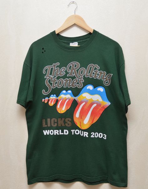 The Rolling Stones Licks Tour 2003 Vintage T-Shirt Band The perfect T-shirt! Green color way Has the "vintage fade" that everyone loves A must have piece Size L PLEASE CHECK MEASUREMENTS!! pit2 pit: 21'6" inches \ 55 cm length on the back: 26'7" inches \ 68 cm shoulders: 21'6" inches \ 55 cm If u have any questions please contact me before purchase Music Tees, Band Tees, Vintage Tshirts, Rolling Stones, Vintage Finds, Tops & Tees, Adult Outfits, T-shirt, Top Outfits