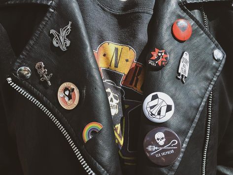 Pins On A Jacket, Leather Jacket Pins, Leather Jacket With Pins, Pins On Jacket, Jacket Pins Aesthetic, Jacket With Pins, Charles Rowland, Army Tags, Goth Jacket