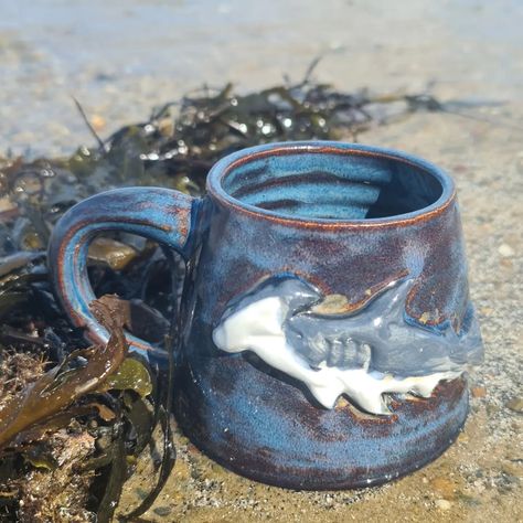 Morning ! I had a lovey walk on the beach yesterday in the sun, took one of the hammerhead shark mugs down for a photoshoot, as you do 🤣. Today's jobs include finishing packing your lovely orders and sorting out a selection of pieces to take into @craftsnorthwales #sharkmug #mugshot #mugshotmonday #mugsonthebeach #hammerheadshark Shark Pottery Painting, Shark Mug, Walk On The Beach, Hammerhead Shark, Beach Walk, Pottery Painting, Mug Shots, Walk On, Mug Designs