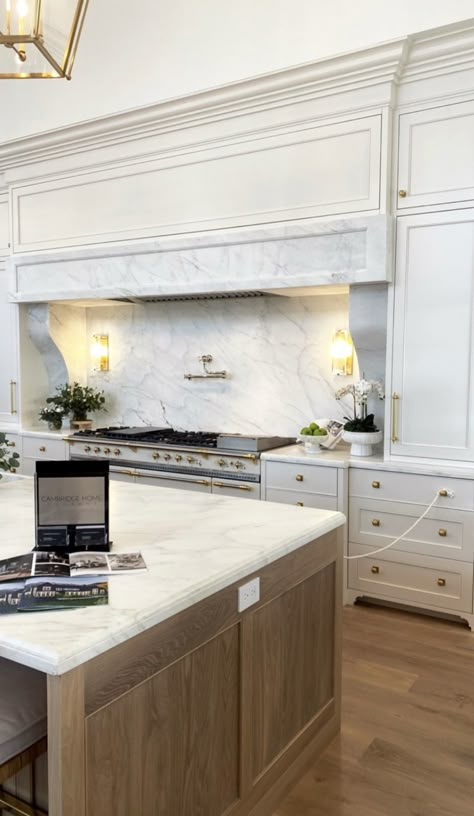 Transitional Range Hood Ideas, Marble Hood, Contemporary European Kitchen, Timeless Range Hood, Oversized Kitchen Hood, Integrated Hood Kitchen, Archways In Kitchen, Millwork Range Hood, Fancy Range Hood