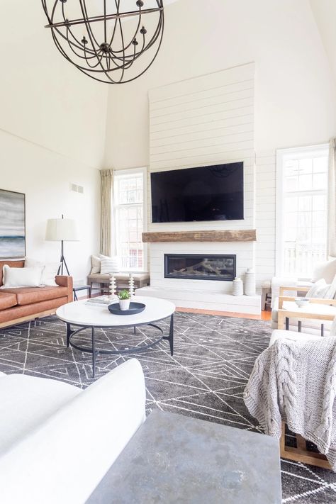 Harper Designs - vaulted ceilings with a tall white shiplap fireplace. We used a reclaimed beam as a mantel and some graphic tile around the hearth.   jaclynharperdesigns.com Mantel Styling, Wood Mantle Fireplace, Tall Fireplace, New House Living Room, Fireplace Tv Wall, Shiplap Fireplace, White Fireplace, Fireplace Remodel, Diy Fireplace