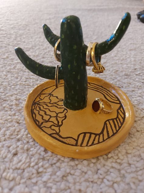 Yellow round base with a pattern and a green cactus that can hold rings Diy Ring Holder Display, Clay Ring Holder Diy, Air Dry Clay Ring Holder, Jewellery Holder Clay, Air Dry Clay Ring, Clay Earring Holder, Jewelry Holder Clay, Ring Holder Clay, Diy Ring Holder