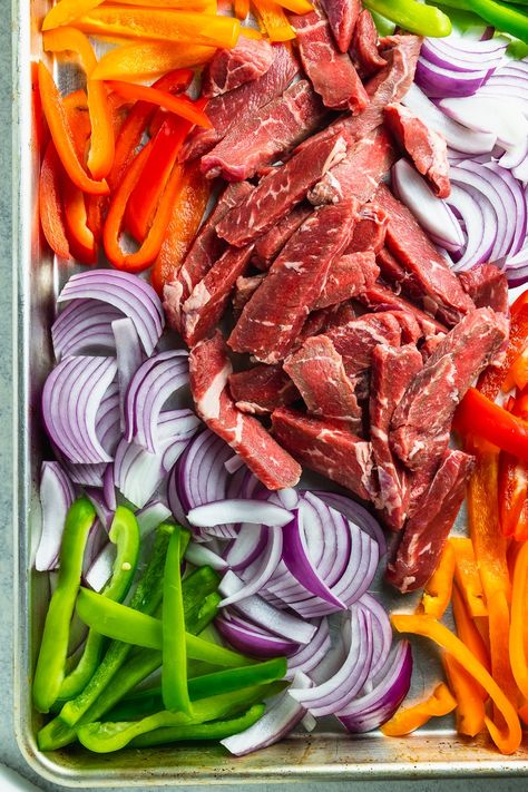 Sheet pan steak fajitas are the weeknight dish that make weeknights a blast! Easy to make, fun to eat, and full of flavor - grab this delicious, fast, and healthy dinner recipe at joeats.net. #joeats #steak #fajitas #sheetpandinner #weeknightdinner One Pan Weeknight Dinners, Weeknight Dinner Sheet Pan, Easy Sheet Pan Steak Fajitas, Sheet Pan Skirt Steak Fajitas, Fajita Pan Sheet, One Pan Fajitas Steak, Easy Pan Dinners, One Pan Recipes Easy, Steak Fajita Sheet Pan