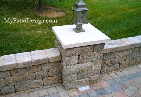 This column is home to a low voltage post light that will illuminate this area perfectly at night.  Download patio plans with seating walls at MyPatioDesign.com Patio Post Lights, Stone Wall Seating Outdoor, Patio Retaining Wall Ideas Seating Areas, Patio Knee Wall Ideas, Patio With Wall Ideas, Patio With Retaining Wall Ideas, Sitting Wall Patio, Patio Wall Ideas, Patio Step