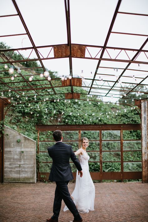 The Standard is one of my favorite venues in Knoxville, Tennessee! This couple had their ceremony at Immaculate Conception Catholic Church, but had their portraits and reception at The Standard Knoxville. Their colors were blush and greenery, and the bride wore a lace wedding gown from Wedding Inspirations Asheville. The bouquets were from Lisa Foster Floral Design. We took their sunset portraits in pouring rain on the patio under bistro lights. Knoxville Botanical Garden Wedding, Knoxville Wedding Venues, Church Wedding Photos, Wedding Tennessee, Tennessee Wedding Venues, Rustic Summer Wedding, Bistro Lights, Downtown Wedding, Pouring Rain