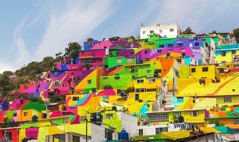 germen crew palmitas mexico rainbow painted mural. the neighborhood has been transformed into a colorful and lively space for habitation Colorful Art Installations, Rainbow Mural, Houses In Mexico, Colorful Houses, Rainbow Paint, Rainbow Painting, Colossal Art, Mexican Street, Diego Rivera