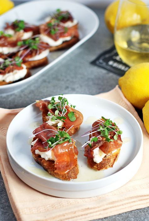 These quick prosciutto crostini feature crispy prosciutto, creamy burrata, and a simple lemon honey drizzle sauce that is sure to be a hit with your guests! Prosciutto Crostini, Honey Drizzle, Crostini Appetizers, Crispy Prosciutto, Toast In The Oven, Burrata Cheese, Lemon Honey, Save Food, Appetizers Easy