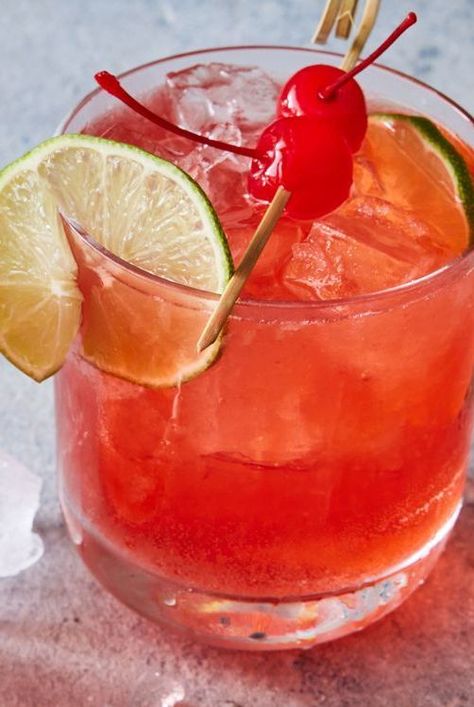 This cherry bomb drink is easy to make with rum, lime juice, lime soda, and grenadine for a fun, festive, and delicious cocktail perfect for parties. Cherry Bomb Drink, Blended Recipes, Cocktail Specials, Romantic Drinks, Bomb Drinks, Cherry Vodka, Mix Drinks, Mixed Drinks Alcohol, Bombe Recipe