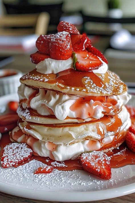 Strawberry Shortcake Pancakes  Ingredients:  1 1/2 cups pancake mix 1 cup milk 1 egg 1 tsp vanilla extract 1 cup strawberries, chopped 1/4 cup whipped cream 2 tbsp sugar 1 tbsp butter  Instructions:  Mix pancake mix, milk, egg, and vanilla. Cook pancakes on a buttered griddle. Toss strawberries with sugar. Layer pancakes with strawberries and whipped cream. Prep Time: 10 mins | Cooking Time: 10 mins | Total Time: 20 mins | Kcal: 350 | Servings: 4 Mini Heart Pancakes, Pancake Dessert Ideas, Summer Pancakes, Pancakes With Ice Cream, Strawberries With Sugar, Pancakes With Strawberries, Strawberry Pancake, Raspberry Pancakes, Strawberries And Whipped Cream