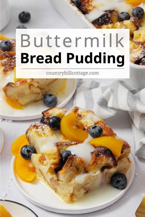 Buttermilk bread pudding is warm, gooey dessert perfection, breakfast and brunch food! Drizzled with a creamy buttermilk custard sauce and fresh fruit, this soft bread pudding is so delicious you won’t want to stop at just one piece. Buttermilk bread pudding is a delicious take on traditional bread pudding. Buttermilk really adds to bread pudding and creates such a delightful, slightly tangy flavor. It’s a great to make-ahead for the holidays and will feed a crowd. | CountryHillCottatge.com Lemon Curd Bread Pudding, Buttermilk Bread Pudding, Buttermilk Pudding Recipes, Bread Pudding With Creme Anglaise, Buttermilk Bread Recipes, French Bread Pudding Recipe, Fruit Bread Pudding, Buttermilk Pudding, Biscuit Bread Pudding