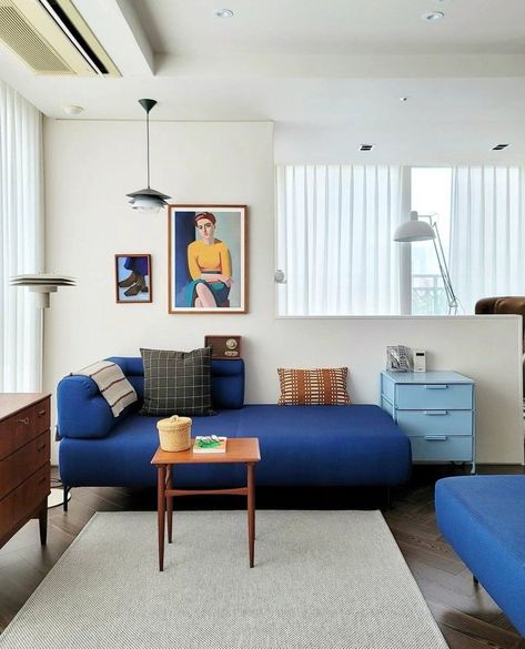 « Modern serenity meets mid-century charm in this cozy corner. The vibrant blue chaise lounge creates a striking contrast against the minimalist backdrop, while the warm wooden accents and eclectic artwork infuse personality. A perfect blend of color and simplicity, this space exudes comfort and style. 🍀 #InteriorDesign #MidCenturyModern #CozyVibes #MinimalistDecor #pinterest Living Room Inspiration Cozy, Small Room Interior, Contemporary Decor Living Room, Loft Interior, Minimalist Room, Minimalism Interior, Contemporary Living Room, A Living Room, Eclectic Home