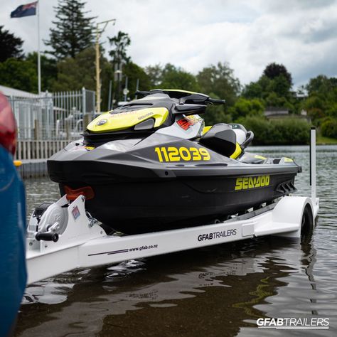 Designed to fit any jetski model, the GFAB single jetski trailer is the perfect match. With features like fully rollered bunks and a sleek design, you’ll turn heads on and off the water.    #GFABTrailers #boattrailer #customtrailer #boatinglife #jetskilife #fishingtime #jetskiing #seadoo Jetski Trailer Ideas, Jetski Trailer, Jet Ski Trailer, Ski Brands, Boat Trailers, Ski Boats, Custom Trailers, Trailer Ideas, Jetski