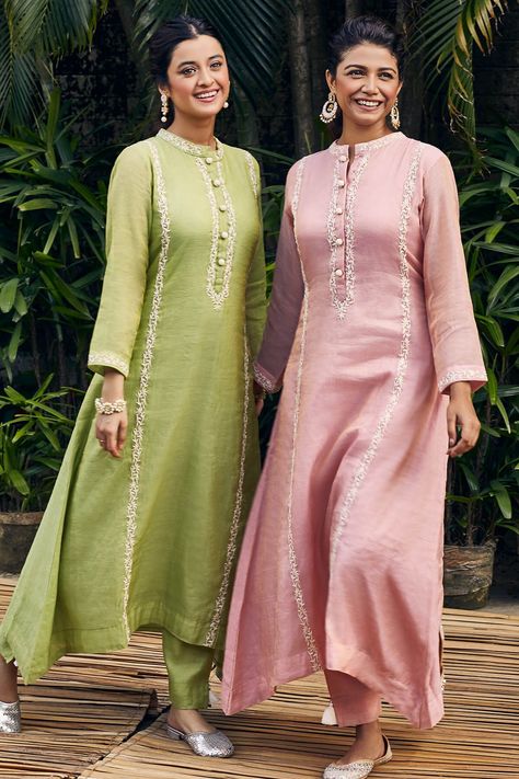 Tissue Chanderi Kurta sets in pastel hues finished with Resham and pearl embroideryYou can wear for any and every small social gatheringIt's a go-to dress for people who want to collect classics. Suits With Pants Indian, Kurta With Pants Designs Women, Cotton Kurti Designs Straight, Cotton Dress Kurti Designs, A Line Kurti Designs Latest Party Wear, Solid Suits For Women Indian, Straight Suits With Pants Indian, Indian Designer Outfits Kurti, Straight Pants With Kurti Designer