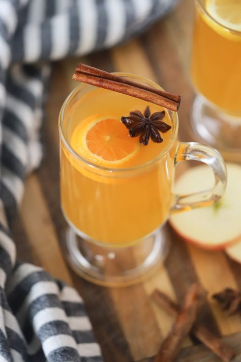 This warm Wassail drink recipe is made with spiced apple cider that’s been infused with baking spices and fresh citrus. It’s the perfect cozy holiday drink to make during the winter months. #thecarefreekitchen #drinks #wassail #applecider #holidays #winter #punch #mulledcider Wassail Drink, Traditional Wassail Recipe, Winter Punch, Wassail Recipe, Baking Spices, Recipe Slow Cooker, Spiced Apple Cider, Mulled Cider, Easy Rice