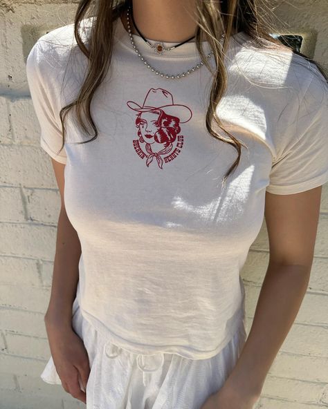 The under $19 baby tee collection 🍒🍓🎀 #western #looks #country #cowgirl #outfit #ideas Cowgirl Outfit Ideas, Western Looks, Cowgirl Outfit, Country Cowgirl, Looks Country, Baby Graphic Tees, Baby Tee, Dream Wardrobe, Infant Tees