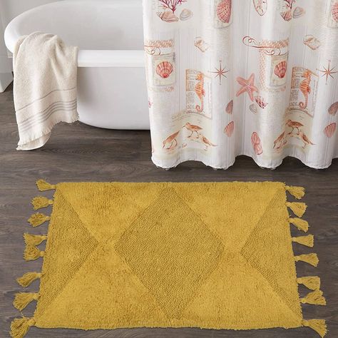 PRICES MAY VARY. 【Cotton Bath Rug】The boho bathroom rugs is made of 100% cotton and with a non-slip bottom pad, bohemian style with hand-woven tassels, make this bohemian bath mat look both cute and fun. When you step out of the tub or shower room, keep your feet dry and away from cold floors 【Boho Bath Mat��】The schweek boho bathroom rug is shaggy and super soft, made for Long-Lasting Absorbency and Comfort. The plush looks very comfortable. Whether you like bohemian style, witch style, hippie st Boho Bathroom Rugs, Mustard Bath, Boho Bathroom Rug, Boho Bath Mat, Boho Apartments, Bohemian Bathroom, Boho Bathroom Decor, Boho Floor, Bohemian Rugs