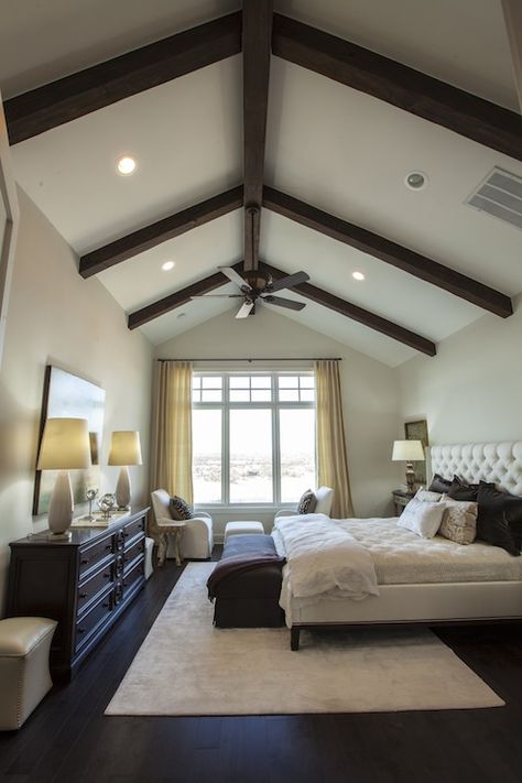 2013 Southern Living Showcase House - Master bedroom design with vaulted ceiling and exposed wood beams over dark wood floors. Vaulted Ceiling Bedroom, Dark Wood Bedroom Furniture, Dark Wood Bedroom, Balinese Decor, Best Modern House Design, Wood Bedroom Furniture, Transitional Bedroom, Dark Wood Floors, Transitional Living Rooms