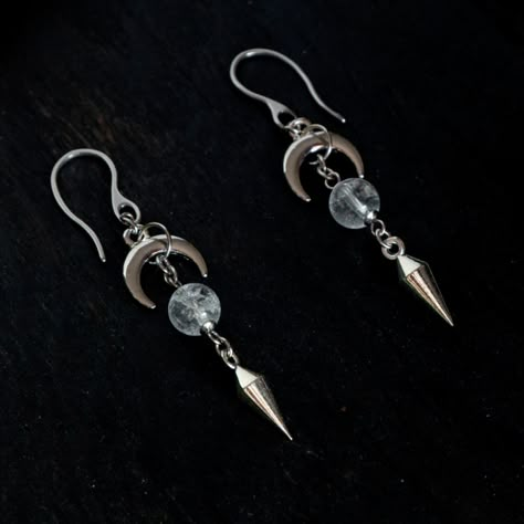 ✨This magical drop earrings featuring upside down moons connected with quartz beads and spikes on chains will add a witchy touch to your everyday look. You can find them on etsy: https://www.etsy.com/listing/865799135 #DropEarrings #UpsideDownMoon #Moon #Earrings #MoonEarrings #WitchJewelry #Quartz #Stone #Spike #SpikeEarrings #Witchy # WitchyEarrings #Magical #gothicearrings #spikes #CrescentMoon #Moonjewelry #handmadejewelry #midnightforestshop #etsyjewelry #etsy Moon Earrings Diy, Gothic Homemade Jewelry, Witchy Dangle Earrings For Festival, Gothic Silver Crystal Jewelry, Handmade Gothic Moon Jewelry, Silver Witchy Earrings, Witchy Earrings, Moon Drop, Goth Earrings