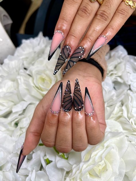 Butterfly stiletto nails Stiletto Butterfly Nails, Steletoes Nails Design, Black And Gold Stiletto Nails, Summer Butterfly Nails, Black Stiletto Nails Design, Summer Nails Stiletto, Nail Inspo Stiletto, Stelito Nails, Acrylic Nails Butterfly