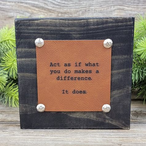 Our rustic shelf sitters are made from our extra board cuts, making each one unique! We stain, seal and then apply an engraved, vegan leather, patch. All sayings are meant to inspire and/or motivate, which makes your block perfect to display in the rooms you spend the most time in! Item Size: (approx.) 5.5"h x 5.5"w. Thickness: 1.65" 2 layer: wood/vegan leather Dust with lint free cloth, do not submerge in water. All wood is sealed with matte polyacrylic. Item is for indoor use only and should n Rustic Signs And Sayings, Inspring Quotes, Letterboard Ideas, Dried Flowers Crafts, Monogramming Ideas, Cricut Signs, School Fundraising, Block Signs, Creative Woodworking