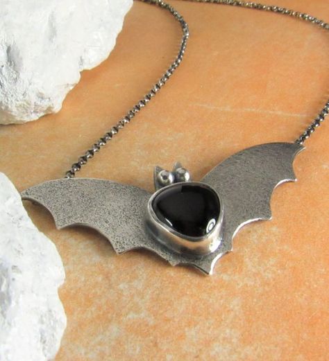 Mocahete: 2" bat pendant of argentium silver with bezel-set black onyx cabochon on 20" sterling silver chain (US $138, October 2022) Bat Pendant, Bat Jewelry, Bat Necklace, Metalsmithing Jewelry, Silky Texture, Goth Jewelry, Argentium Silver, Halloween Jewelry, Samhain