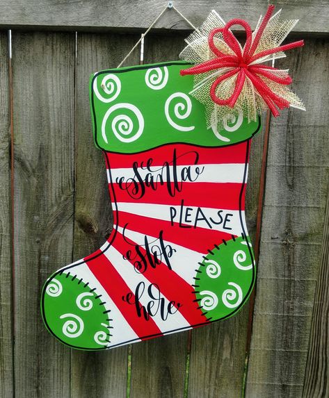 Christmas Stocking Door Hanger, Stocking Door Hanger, Painted Wood Crafts, Christmas Decorations Diy Crafts, Wood Door Hangers, Cnc Projects, Christmas Door Hanger, Christmas Stuff, Wood Patterns