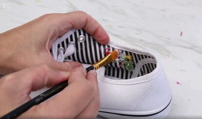 This is a guide on easy rose embroidery. Learn how to embroider shoes by hand in this step-by-step tutorial. Shoe Patches Diy, How To Embroider Shoes By Hand, How To Embroider On Shoes, Embroidery Sneakers Diy, Embroidery Tennis Shoes, Embroidered Shoes Diy Patterns, Hand Embroidered Shoes, Embroidery On Shoes Diy, How To Embroider Shoes