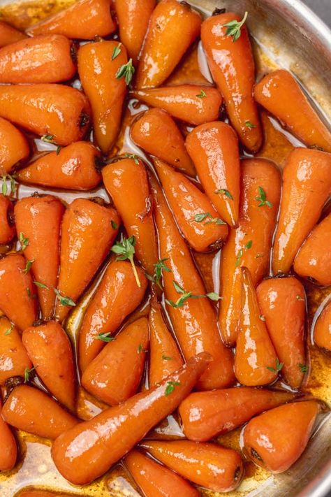 These brown sugar glazed carrots are a perfect side to any dish. Tender baby carrots cooked in a mixture of butter and brown sugar on the stove top. It is quick and very easy to make and comes together in 10 minutes. Let me show you how to make the best brown sugar glazed carrots you can serve at your next gathering. This recipe is perfect for picky eaters, the aroma from the caramelised butter would make them change their minds. #glazedcarrots #thanksgivingrecipes #sidedishrecipes Caramelized Carrots Stove Top, Carrots Glazed Brown Sugar, Thanksgiving Carrots Brown Sugar, Carmelized Carrots Stove Top, Cooked Carrots With Brown Sugar, Stovetop Glazed Baby Carrots, Caramelised Carrots, Mexican Chicken Breast Recipes, Carmelized Carrots Brown Sugar Stove Top